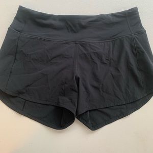 lululemon black speed ups mid rise 4"